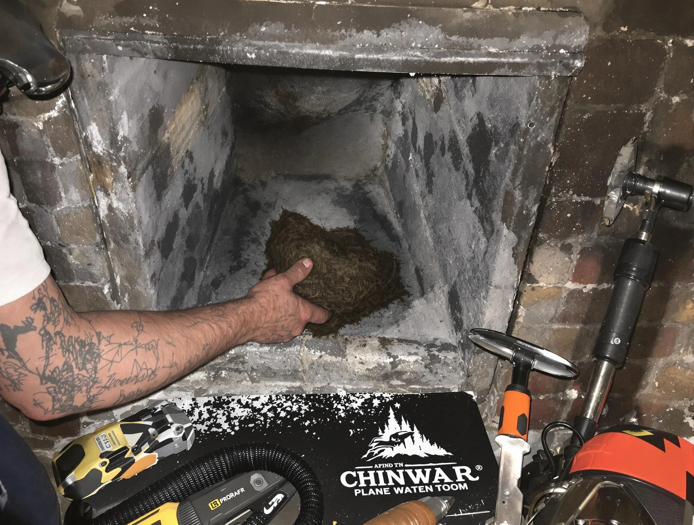 Economy Chimney Sweep safely removing debris and screening chimney in Economy, PA